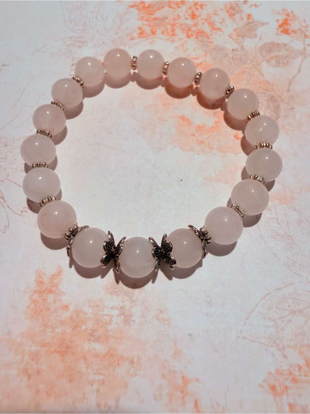 Rose Quartz Beaded Stretch Bracelet with Silver Floral Accents